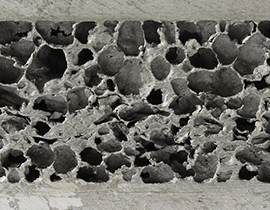 Open Pored Aluminum Foam for Vacuum Plates and Heat Exchangers